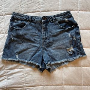 Women’s size 12 Sound Style distressed, raw hem blue Jean shorts